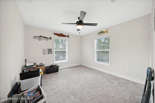 a view of a balcony with wooden floor and outdoor space