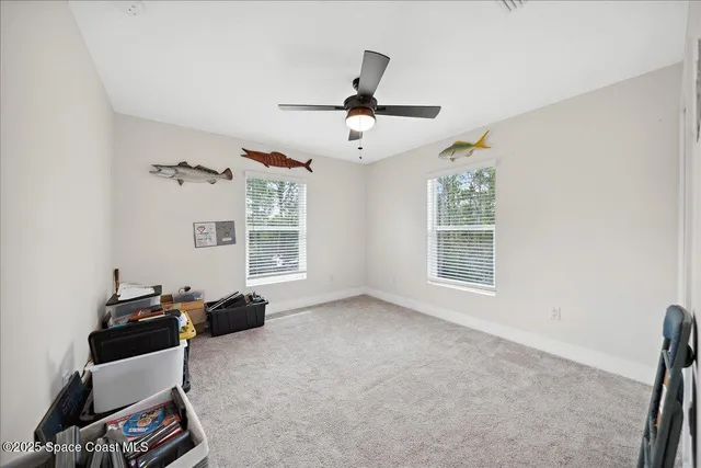 a view of a balcony with wooden floor and outdoor space