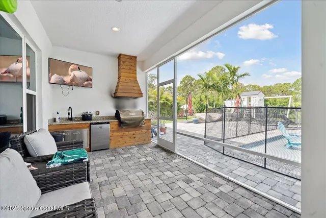 a view of a lake and green valley