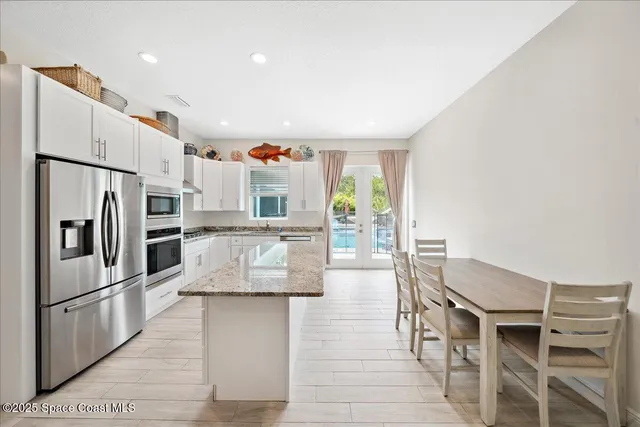 a view of house with outdoor space and entertaining space