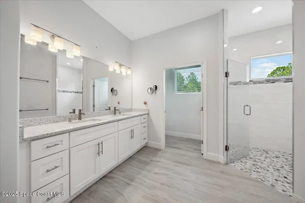 a view of a swimming pool from a balcony