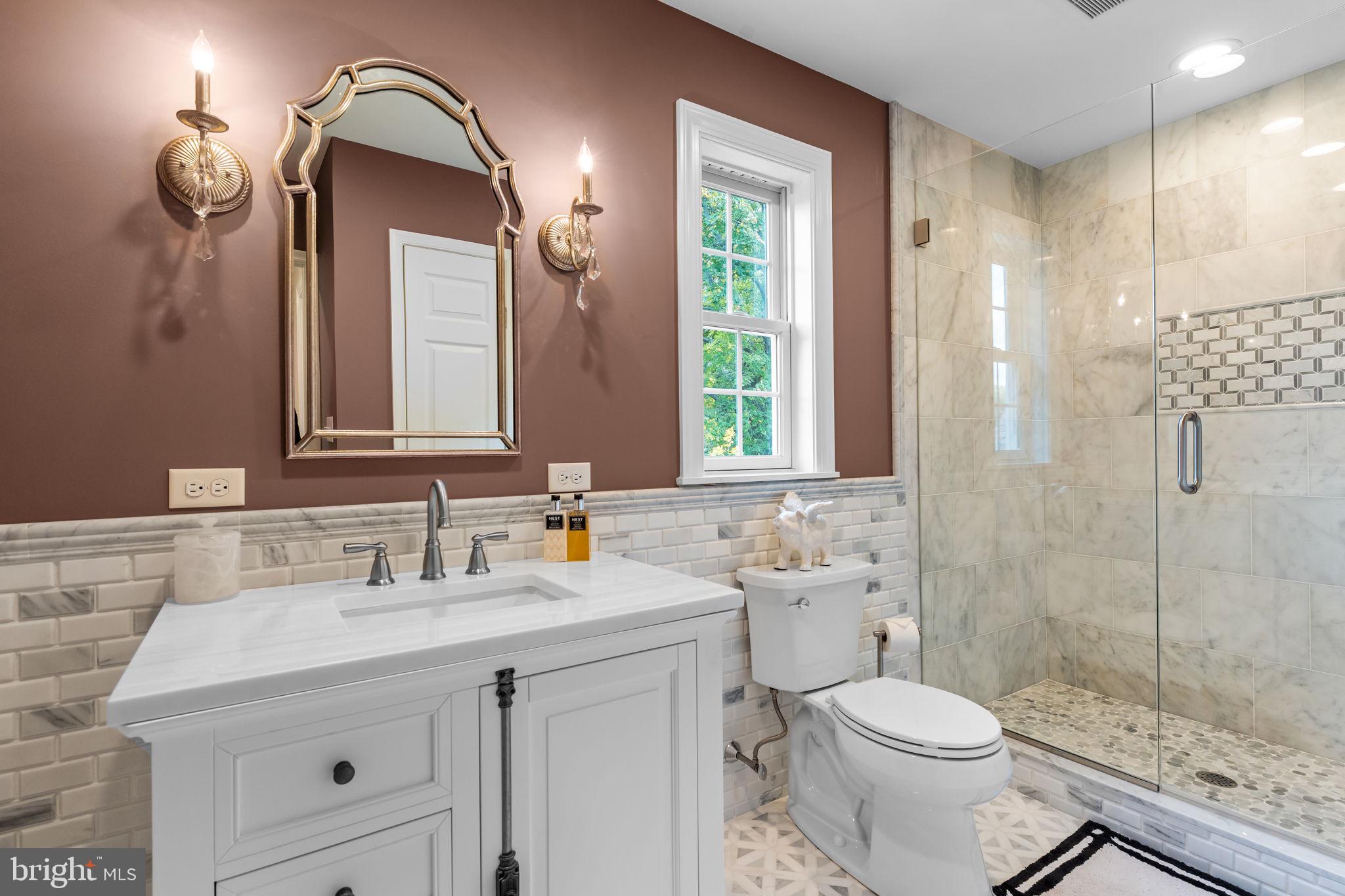 201 Golf Hills Road Havertown, PA 19083 - Photo 13 of 71 a bathroom with a sink a toilet and shower