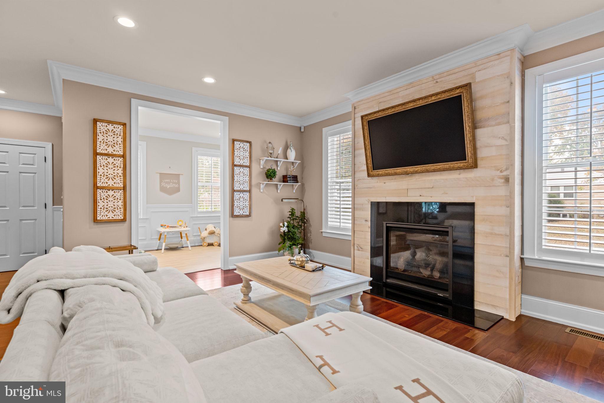 201 Golf Hills Road Havertown, PA 19083 - Photo 15 of 71 a bedroom with a bed and a fireplace