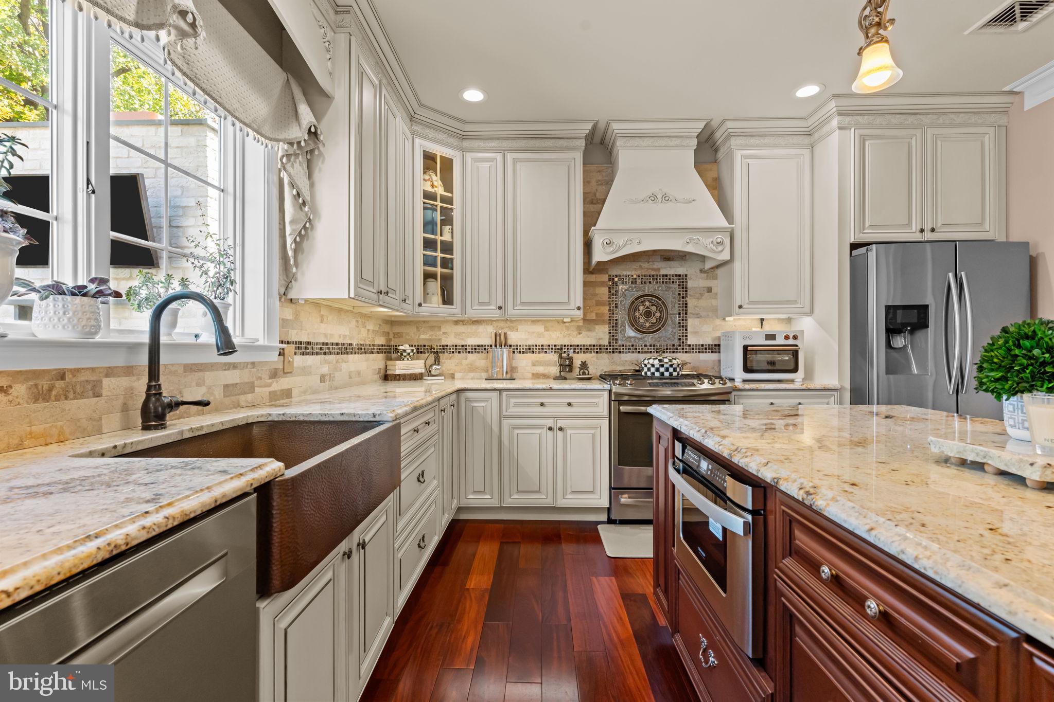 201 Golf Hills Road Havertown, PA 19083 - Photo 21 of 71 a kitchen with a sink stove and cabinets
