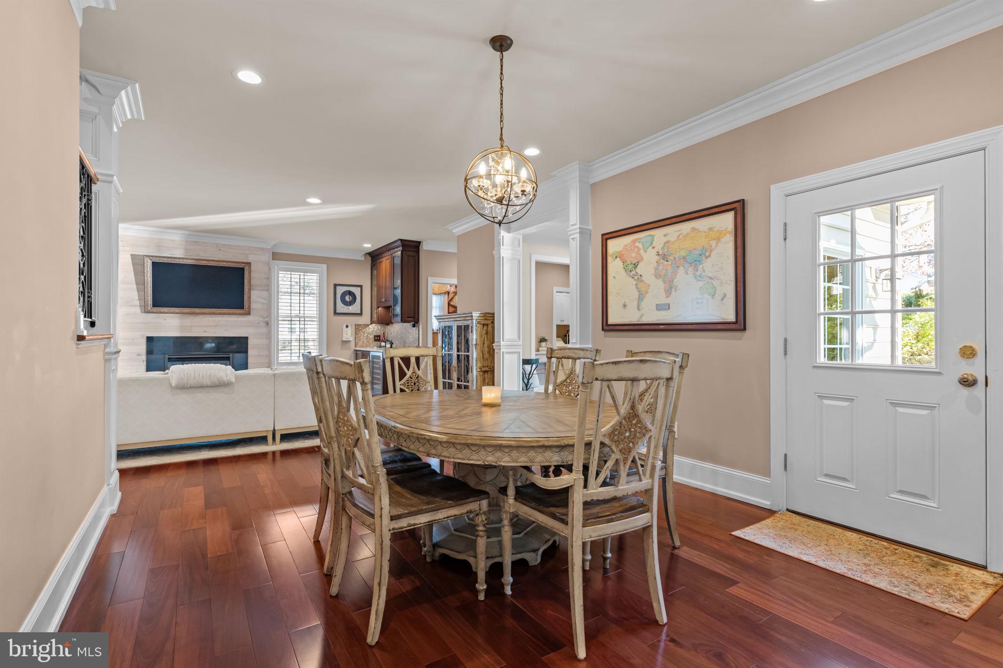 201 Golf Hills Road Havertown, PA 19083 - Photo 25 of 71 a view of a dining room with furniture wooden floor and chandelier