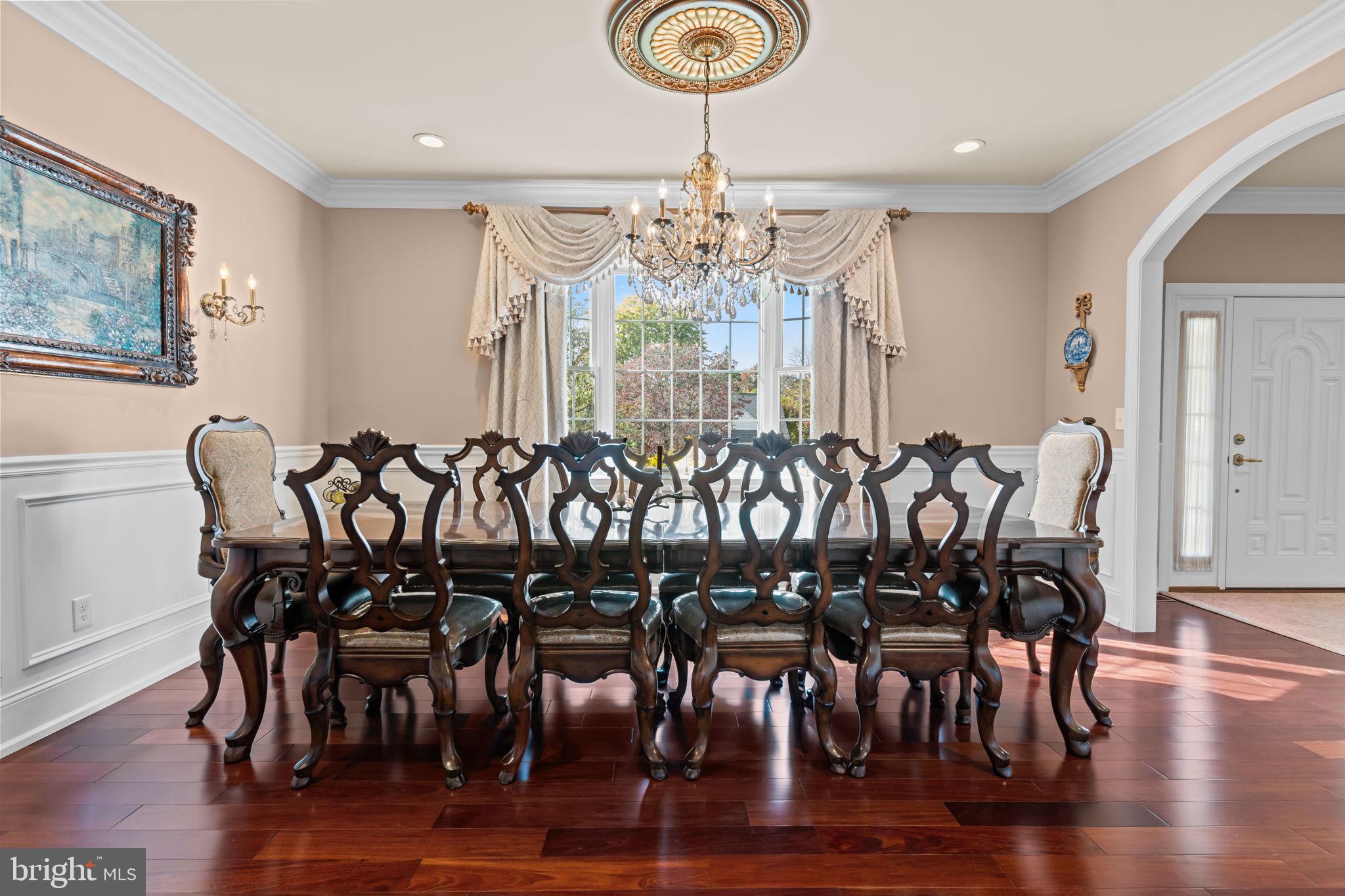 201 Golf Hills Road Havertown, PA 19083 - Photo 26 of 71 a view of a dining room with furniture wooden floor and chandelier