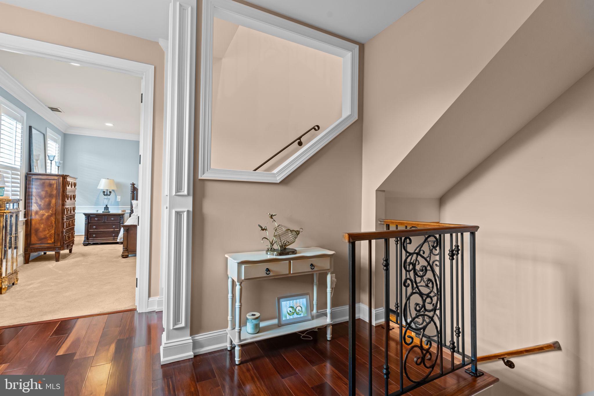 201 Golf Hills Road Havertown, PA 19083 - Photo 33 of 71 a view of a hallway with wooden floor and staircase