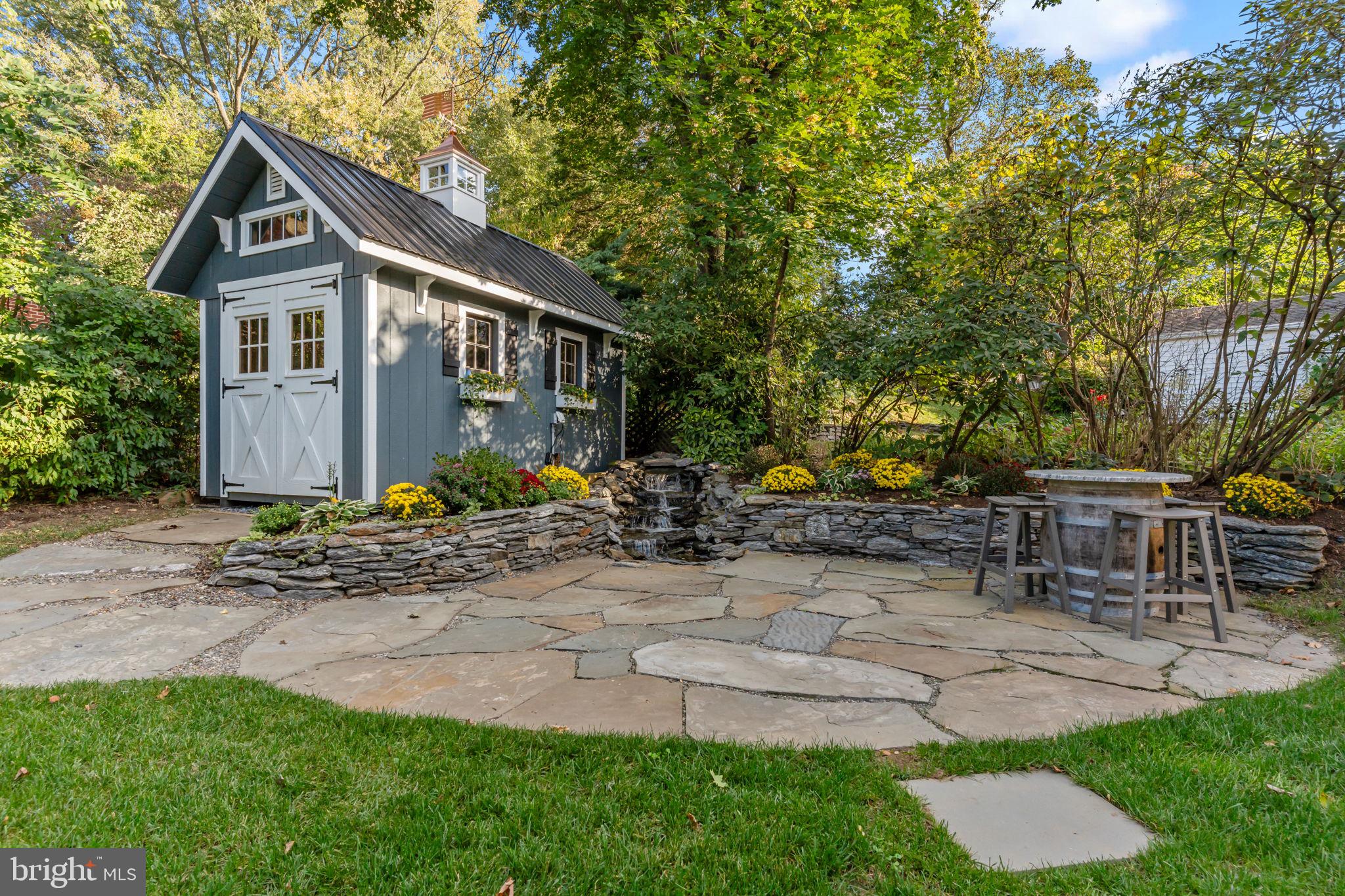 201 Golf Hills Road Havertown, PA 19083 - Photo 4 of 71 a front view of a house with garden
