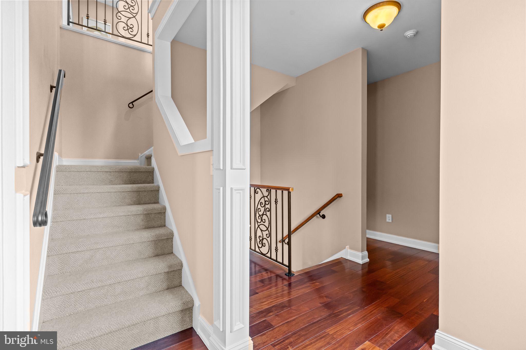 201 Golf Hills Road Havertown, PA 19083 - Photo 42 of 71 a view of staircase with wooden floor and white walls