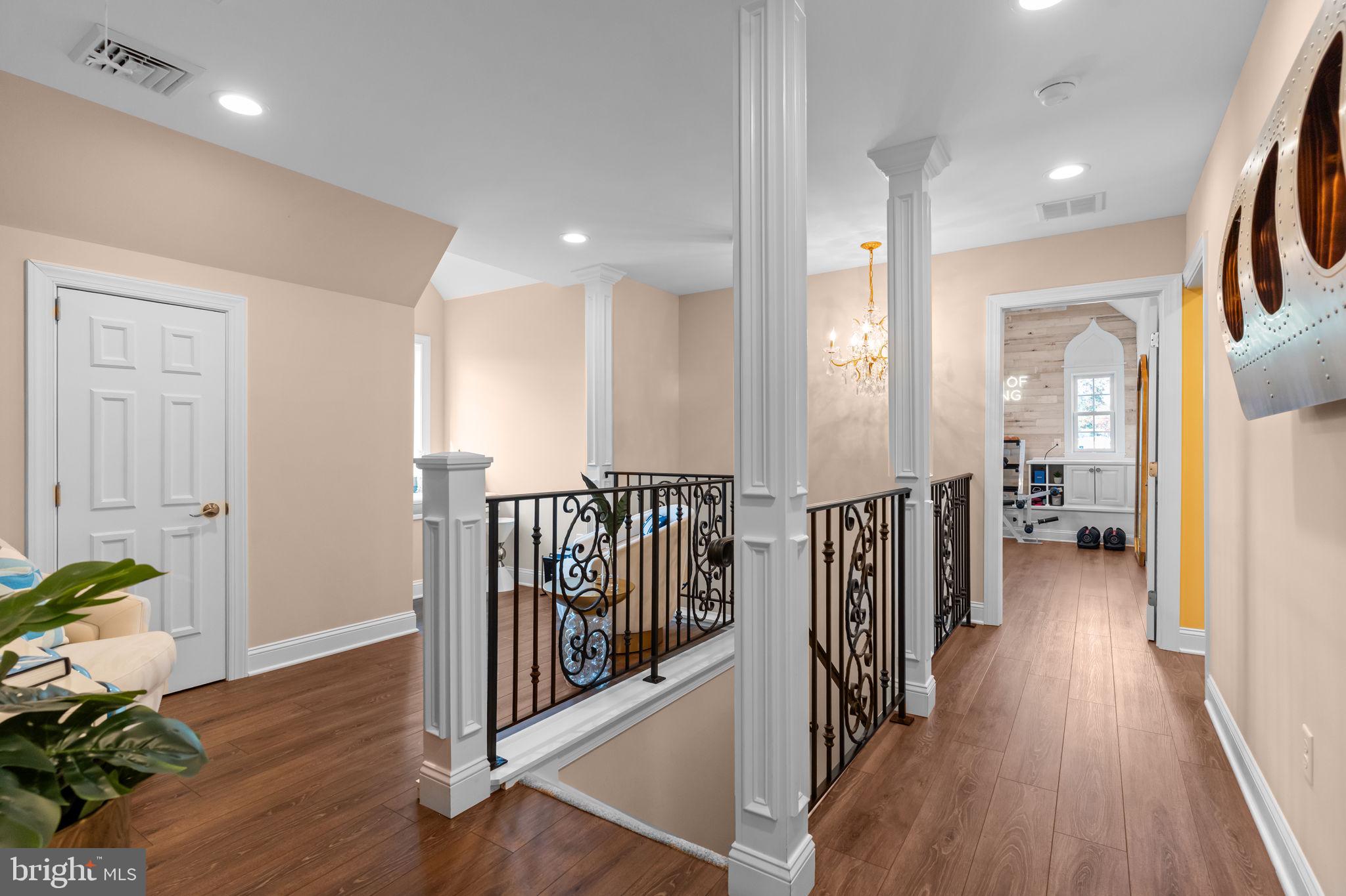 201 Golf Hills Road Havertown, PA 19083 - Photo 43 of 71 a view of a hallway with wooden floor