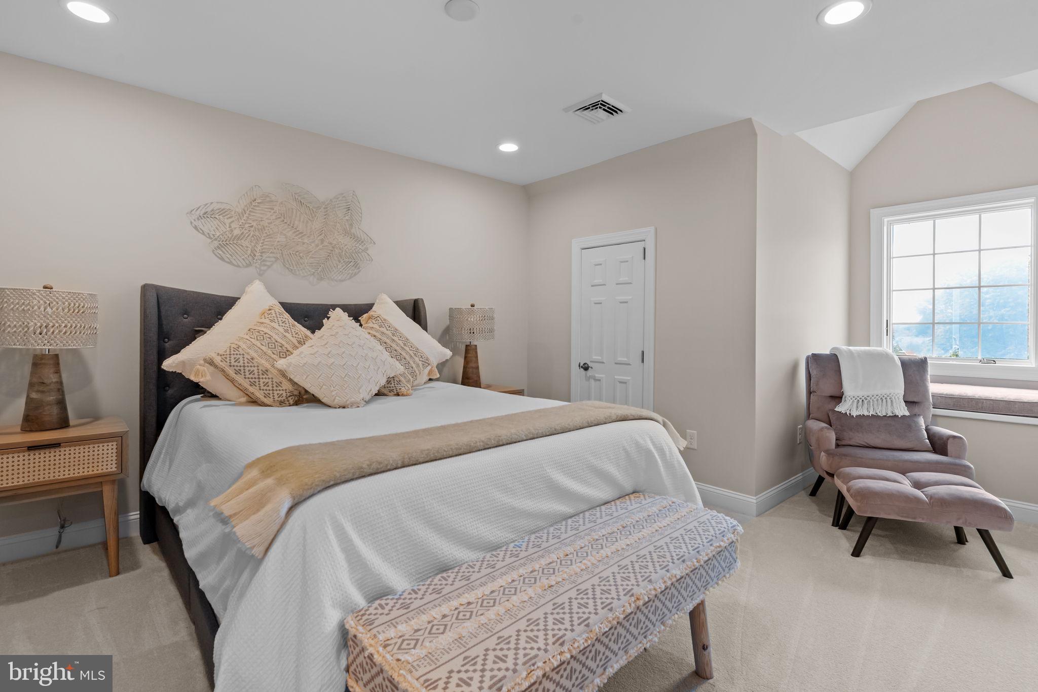 201 Golf Hills Road Havertown, PA 19083 - Photo 47 of 71 a bedroom with a bed and a couch