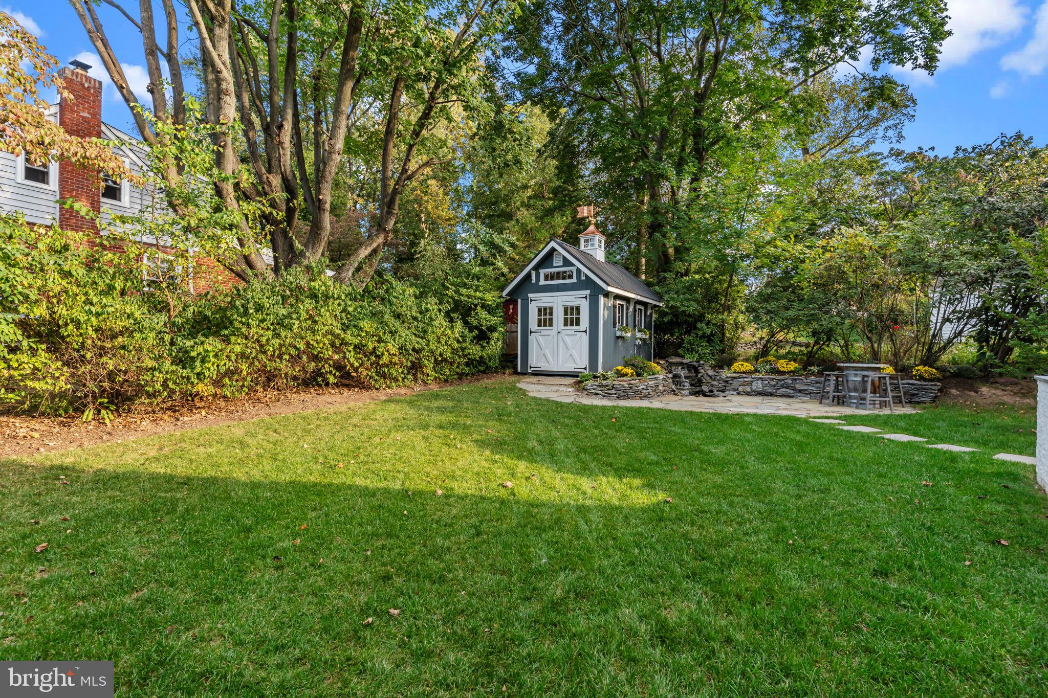 201 Golf Hills Road Havertown, PA 19083 - Photo 51 of 71 a front view of a house with yard and green space