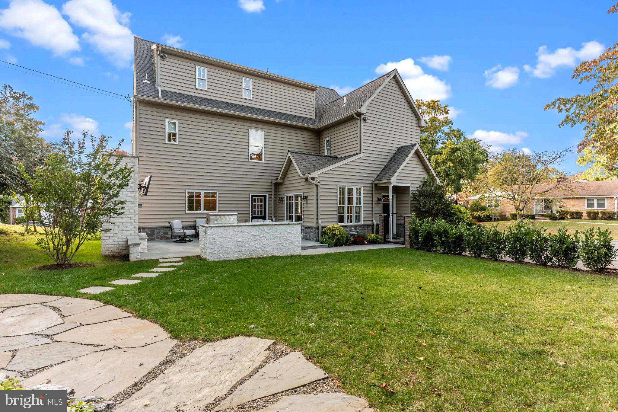 201 Golf Hills Road Havertown, PA 19083 - Photo 53 of 71 a view of a house with a yard and sitting area