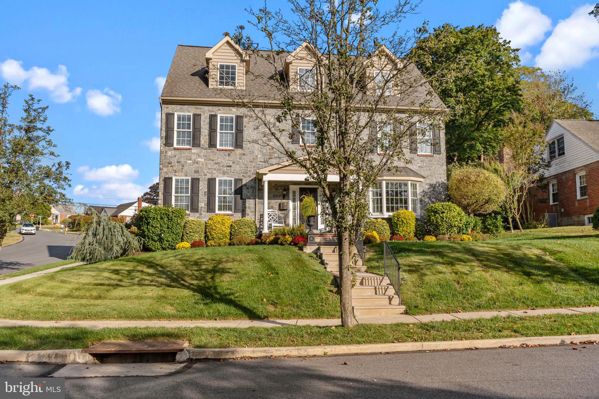 201 Golf Hills Road Havertown, PA 19083 - Photo 67 of 71 a front view of a house with garden