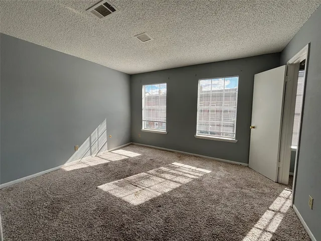 a view of empty room with front door