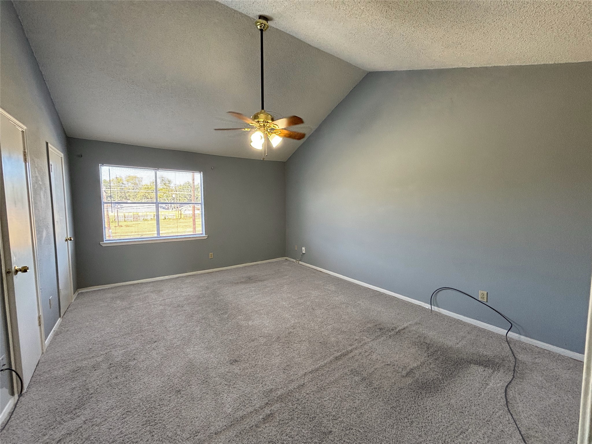 7700 Creekbend Drive, Unit 37 Houston, TX 77071 - Photo 8 of 9 a view of an empty room with a window