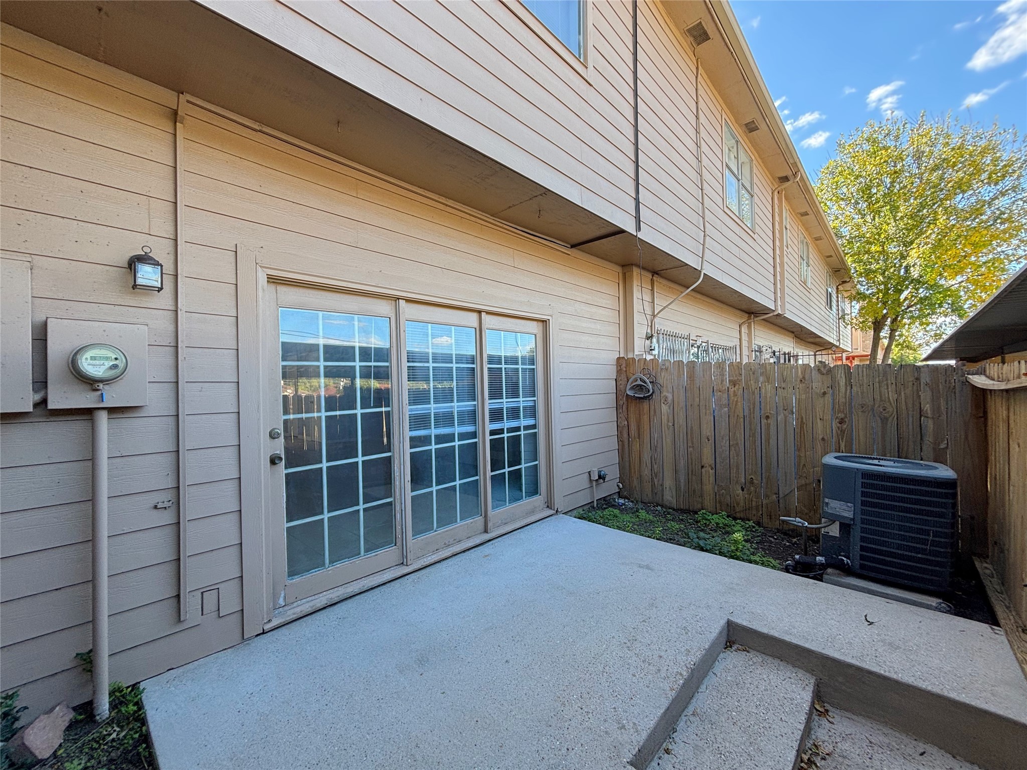 7700 Creekbend Drive, Unit 37 Houston, TX 77071 - Photo 9 of 9 a view of a backyard with plants and wooden fence