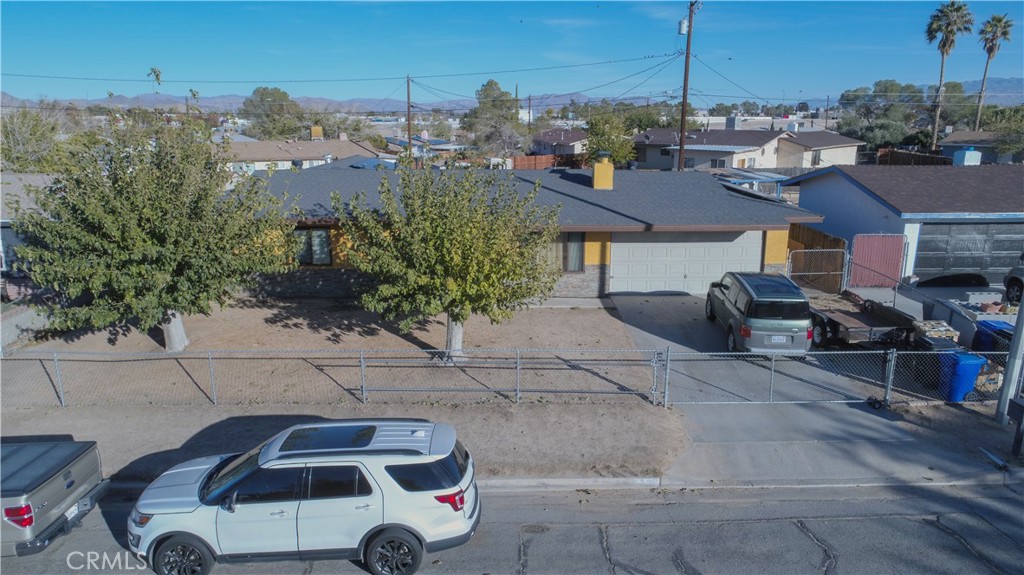 14993 Condor Road Victorville, CA 92394 - Photo 1 of 1 a car parked on the side of the road
