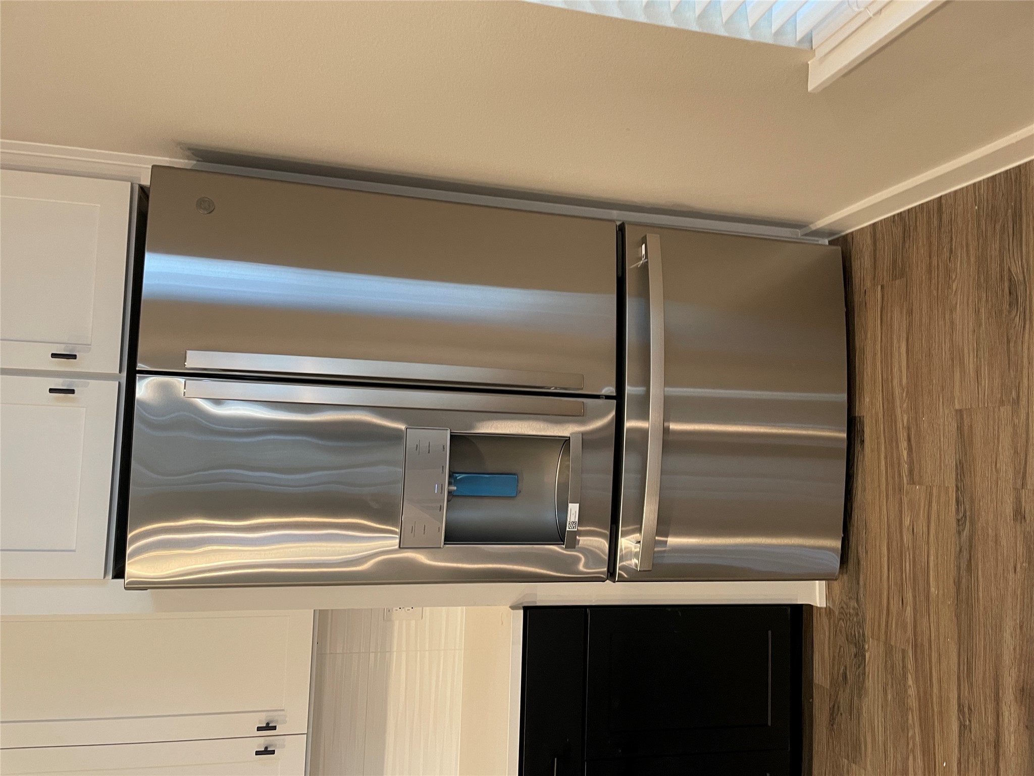 3809 Valley View Road, Unit 13 Austin, TX 78704 - Photo 26 of 27 an empty room with wooden floor and cabinet