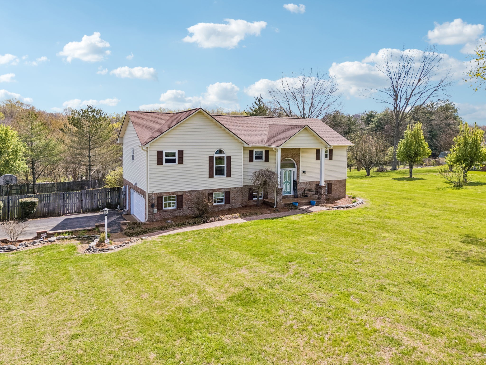 97 Oak Valley Drive Spring Hill, TN 37174 - Photo 11 of 40 a house view with swimming pool and garden space
