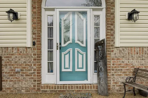 a view of a door of a house with a door