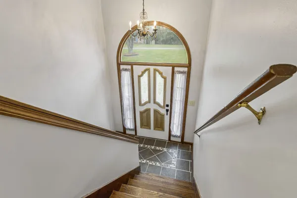 a view of staircase with large window