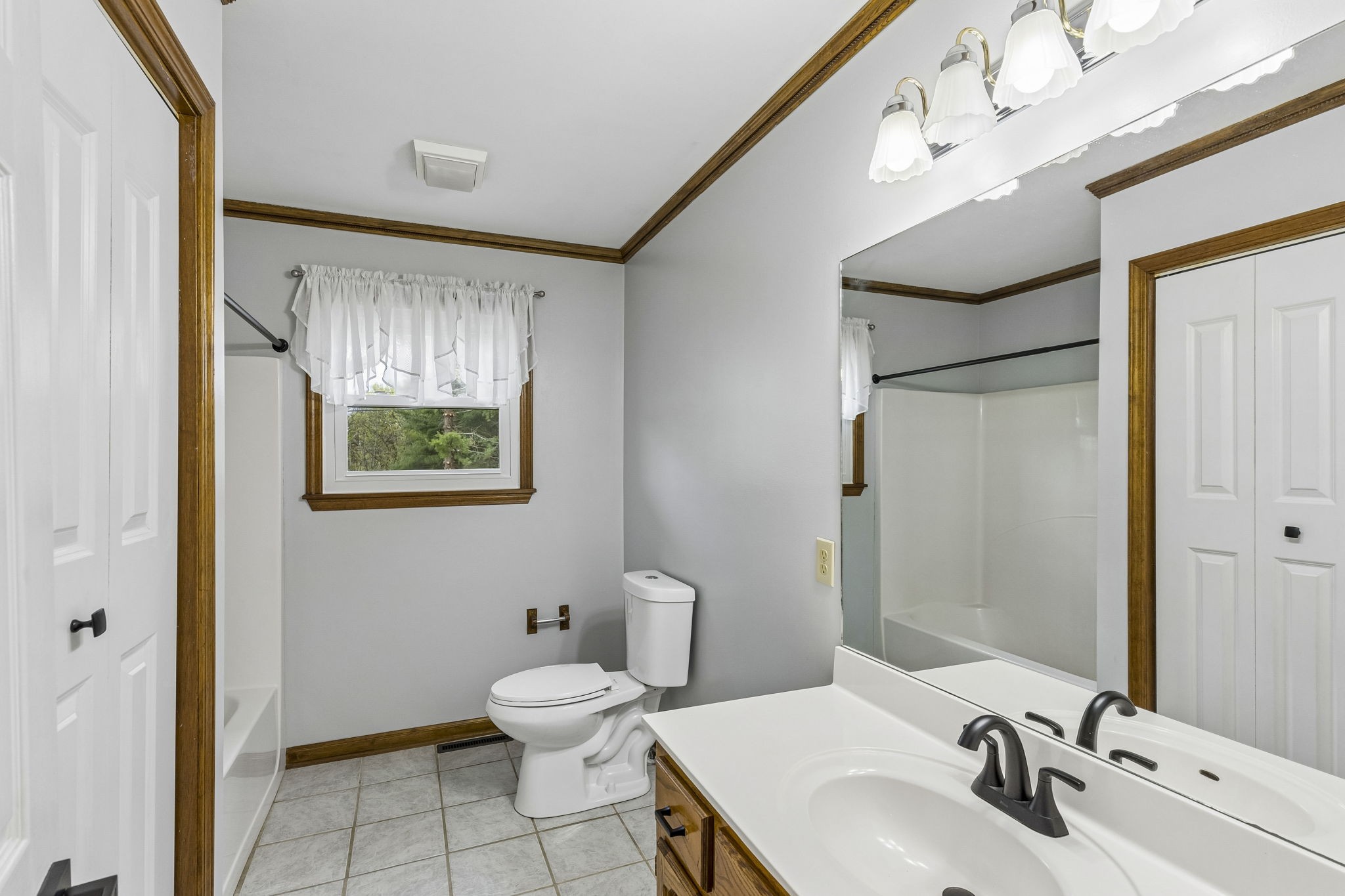 97 Oak Valley Drive Spring Hill, TN 37174 - Photo 28 of 40 a bathroom with a toilet sink and mirror