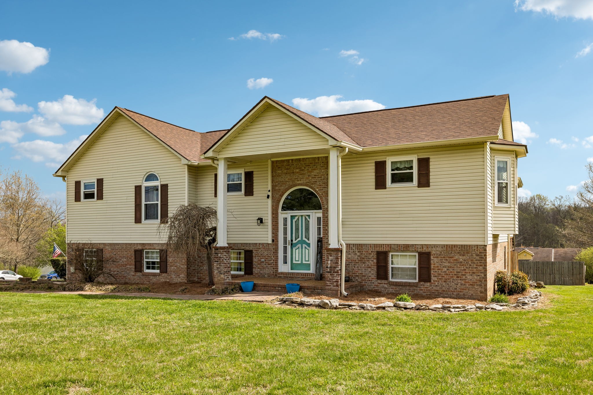 97 Oak Valley Drive Spring Hill, TN 37174 - Photo 3 of 40 a front view of a house with a yard