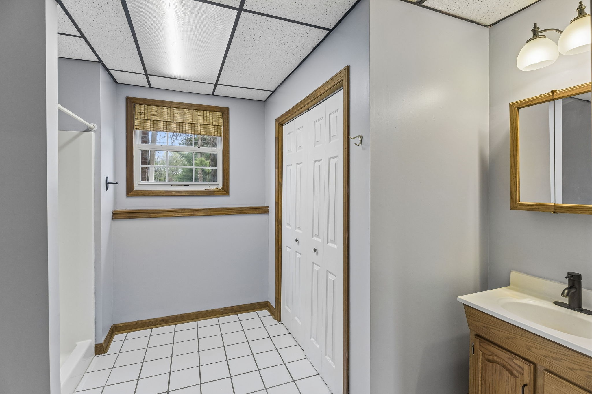 97 Oak Valley Drive Spring Hill, TN 37174 - Photo 38 of 40 a view of an empty room with window and cabinet