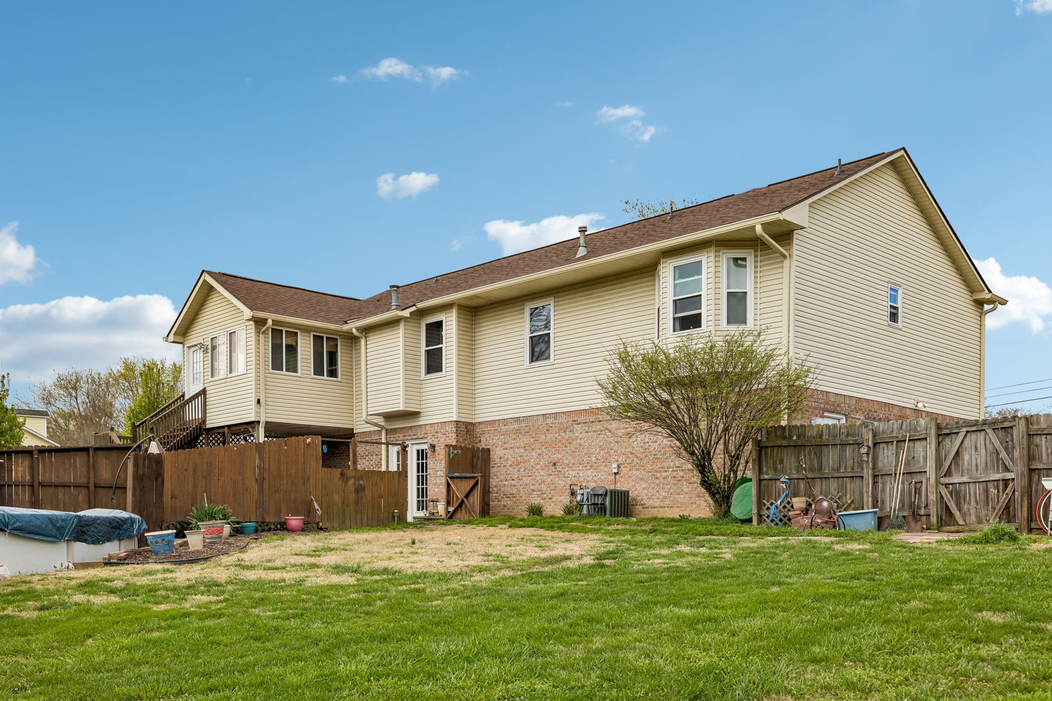 97 Oak Valley Drive Spring Hill, TN 37174 - Photo 4 of 40 a front view of a house with a yard