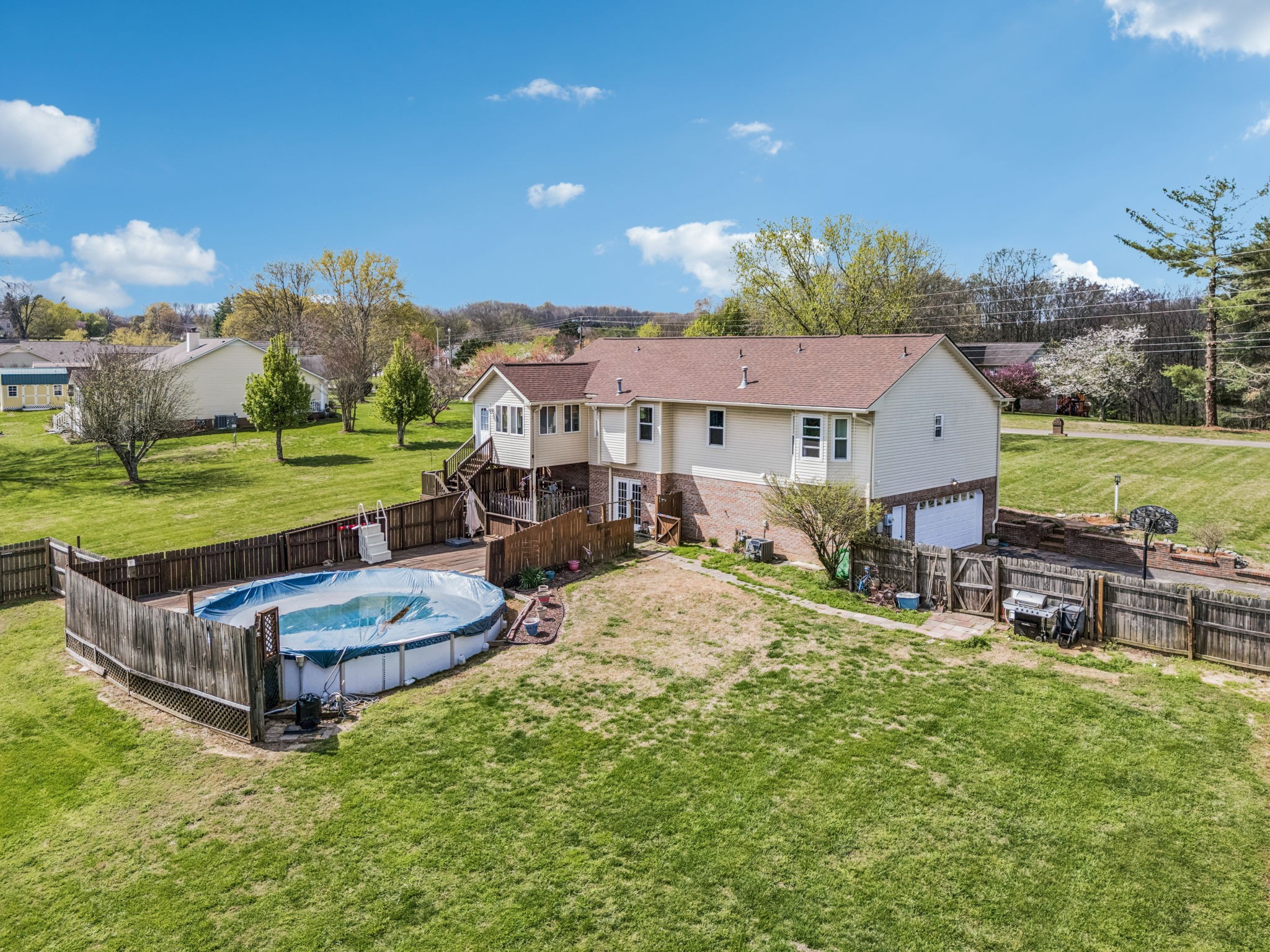97 Oak Valley Drive Spring Hill, TN 37174 - Photo 9 of 40 an aerial view of a house with garden space and street view
