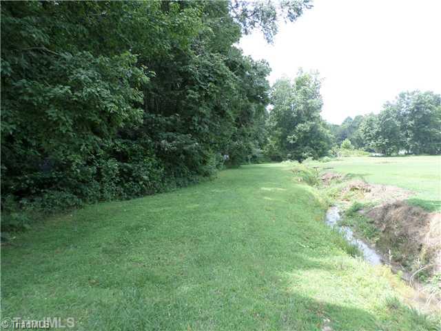 1285 Frye Bridge Road Clemmons, NC 27012 - Photo 14 of 16 Land. creek meanders along the right property line that is relaxing to take a morning stroll!