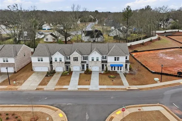 an aerial view of a house with a garden
