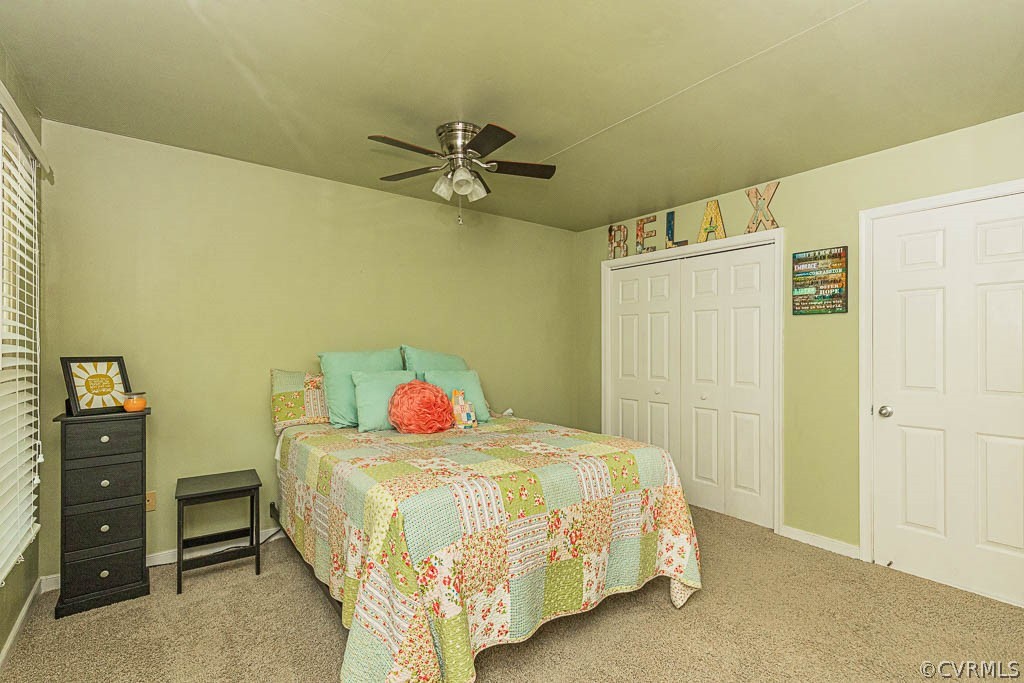 5817 Mill Spring Road Midlothian, VA 23112 - Photo 19 of 29 a bedroom with a bed and cabinets
