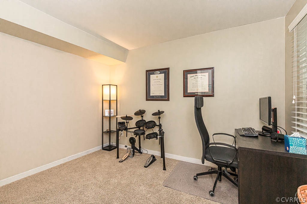 5817 Mill Spring Road Midlothian, VA 23112 - Photo 22 of 29 a view of a workspace with furniture and a window