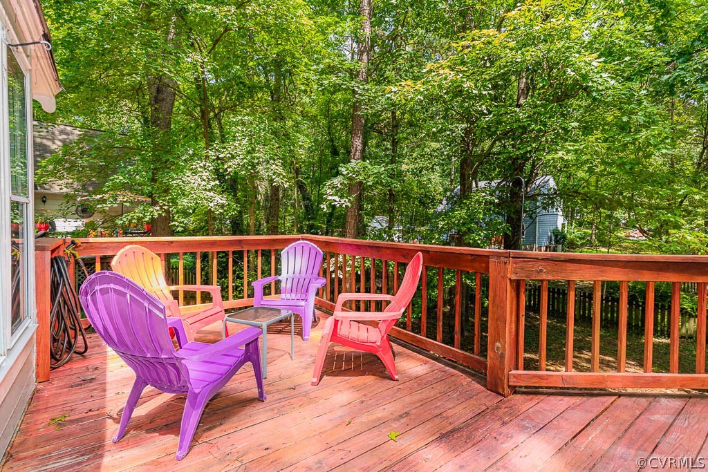 5817 Mill Spring Road Midlothian, VA 23112 - Photo 25 of 29 a view of a chairs on wooden deck