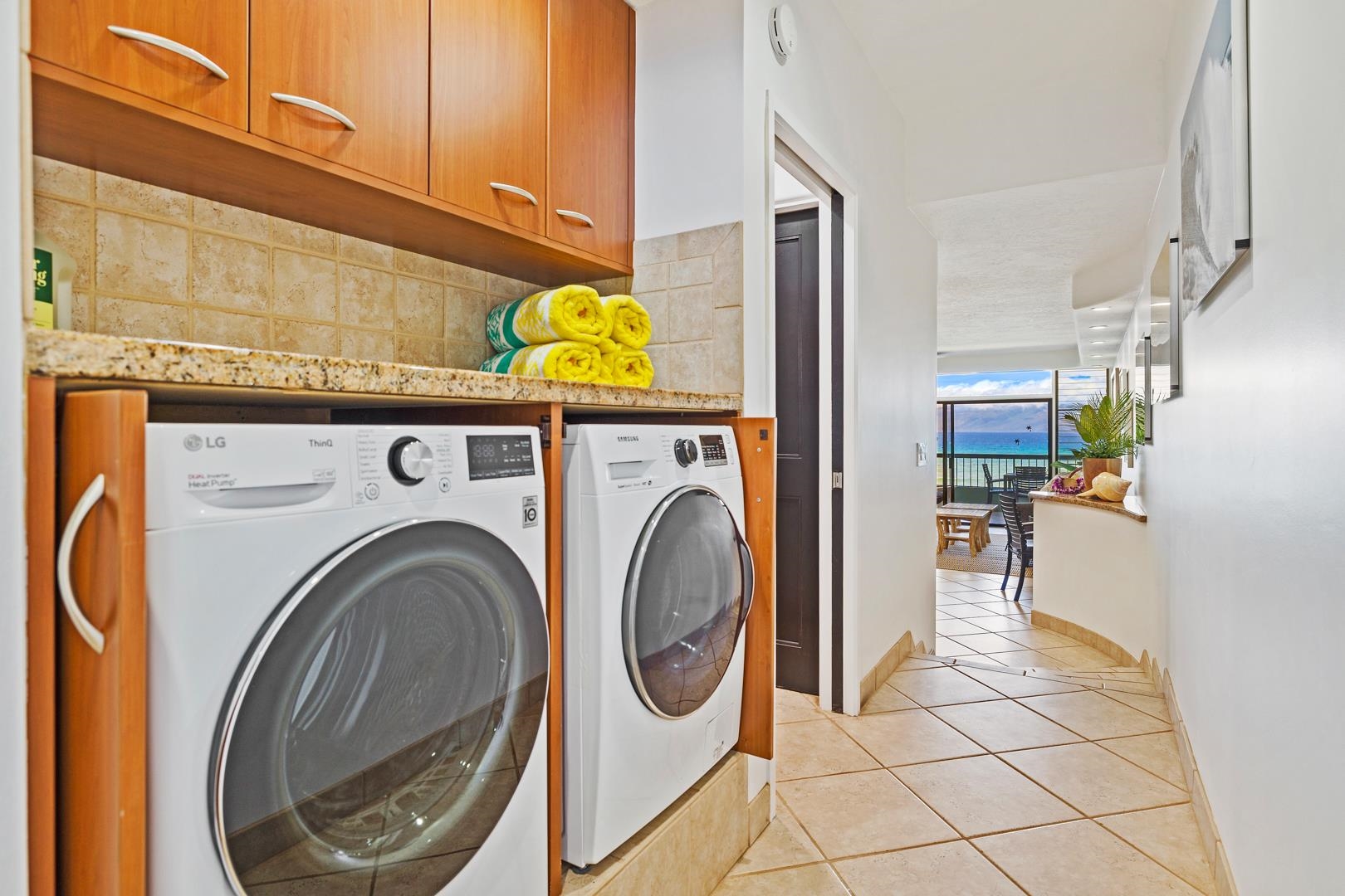 3875 Lower Honoapiilani Road, Unit B305 Lahaina, HI 96761 - Photo 33 of 35 a utility room with dryer and washer