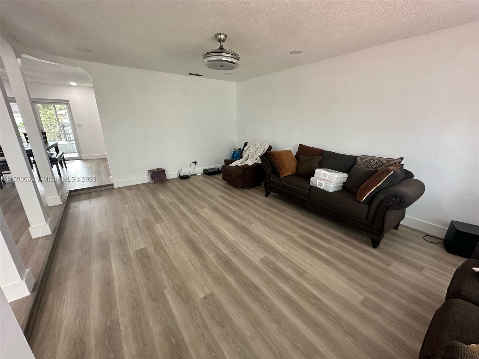 2131 Southwest 98th Place Miami, FL 33165 - Photo 5 of 22 a living room with furniture