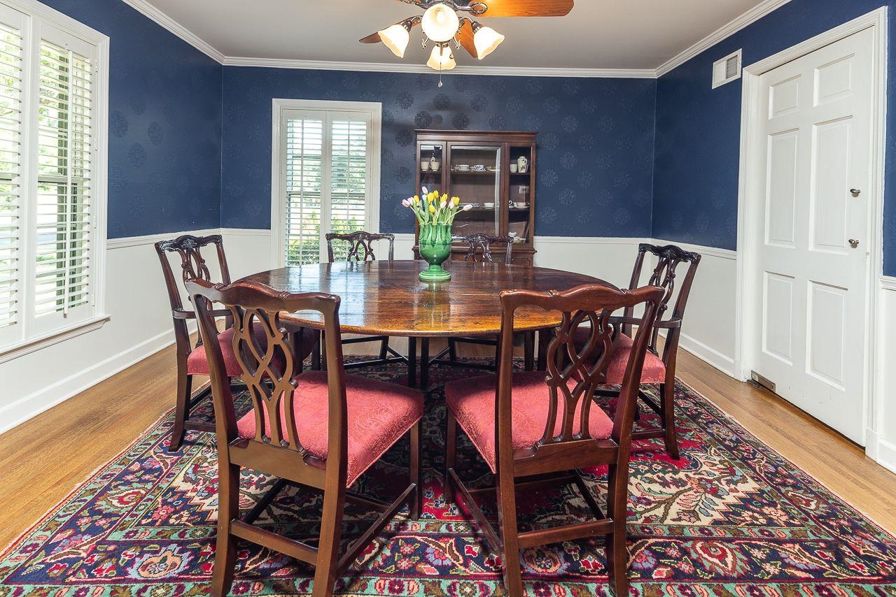 294 North Perkins Road Memphis, TN 38117 - Photo 5 of 20 a view of a dining room with furniture and wooden floor