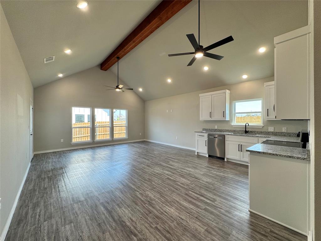 300 Rike Road Mabank, TX 75147 - Photo 6 of 18 a view of a kitchen with a sink and wooden floor