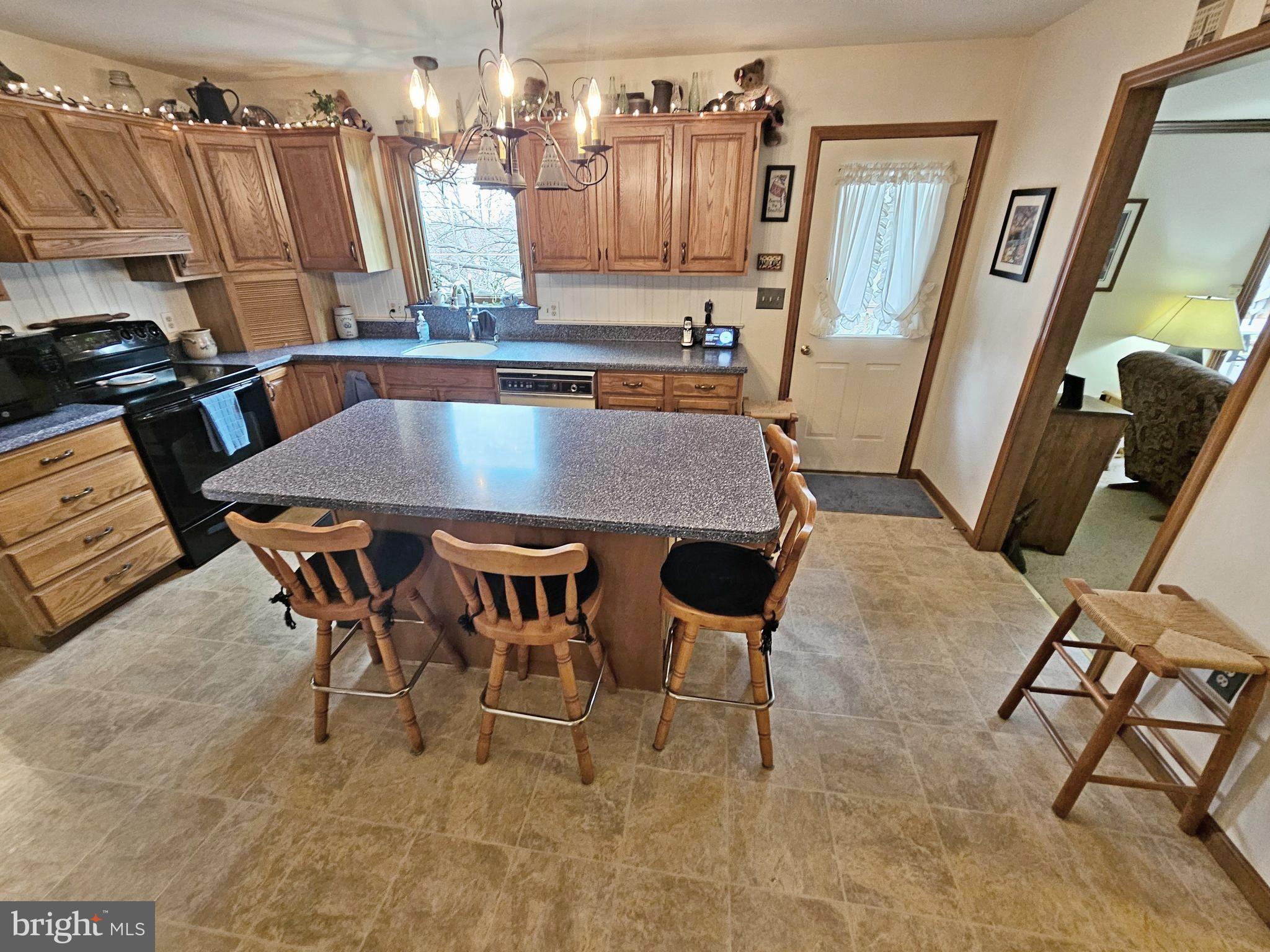 402 Snyder Hill Road Lititz, PA 17543 - Photo 18 of 35 a dining room with chairs and a table