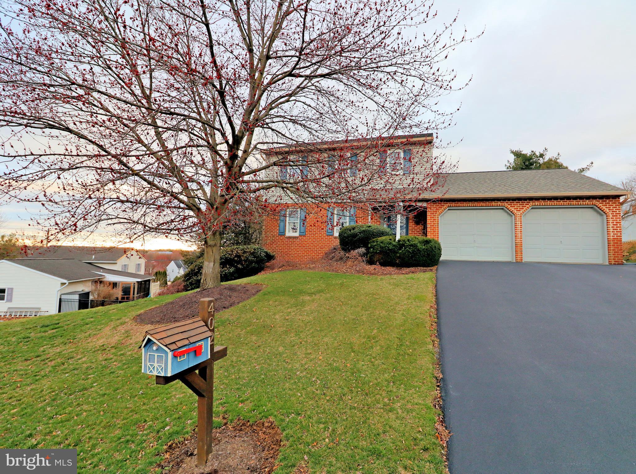 402 Snyder Hill Road Lititz, PA 17543 - Photo 29 of 35 a front view of a house with garden