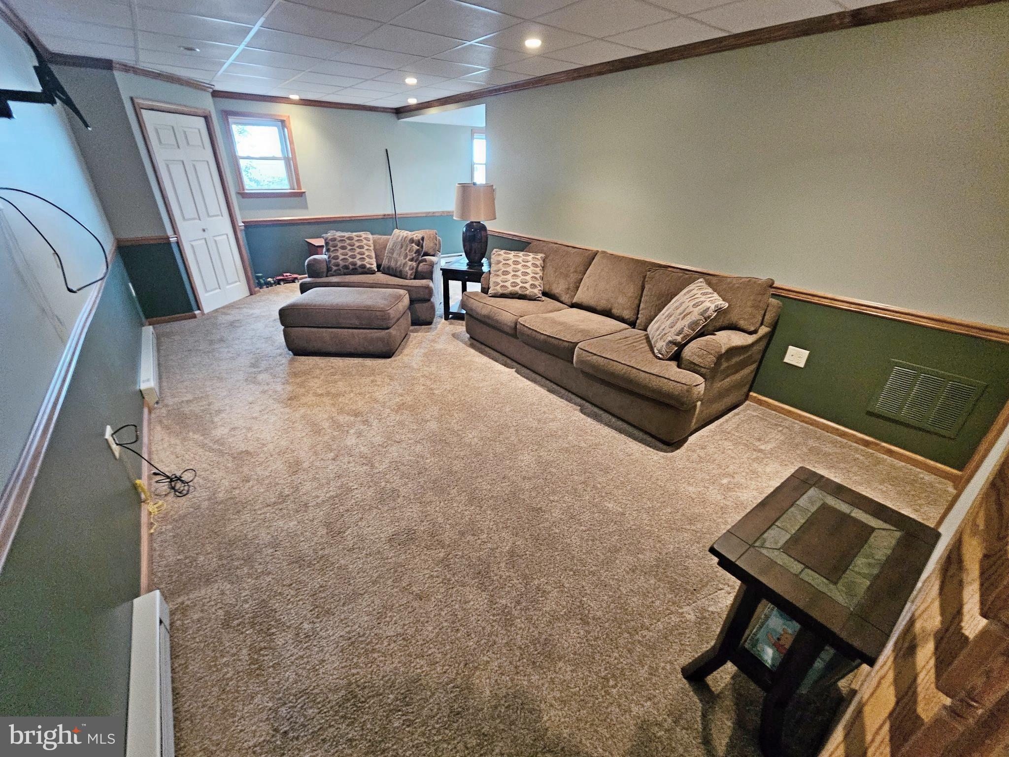 402 Snyder Hill Road Lititz, PA 17543 - Photo 8 of 35 a living room with furniture and a window