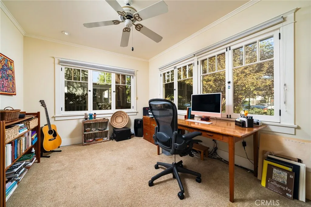 335 Harvard Avenue North Claremont, CA 91711 - Photo 17 of 71 a view of a workspace with furniture and a window