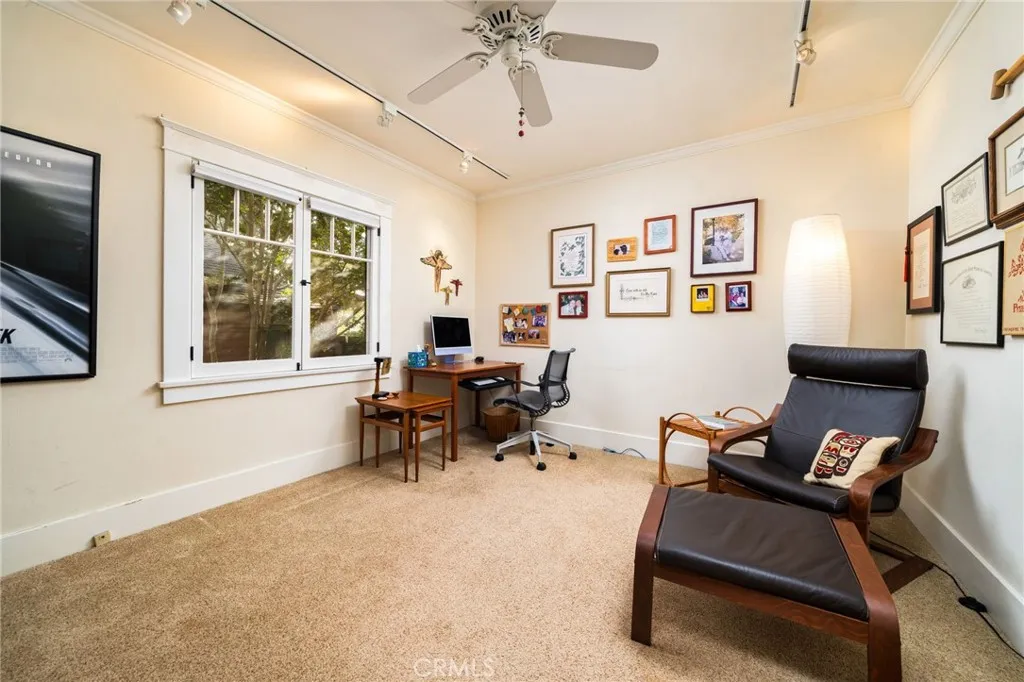 335 Harvard Avenue North Claremont, CA 91711 - Photo 23 of 71 a living room with furniture and a window