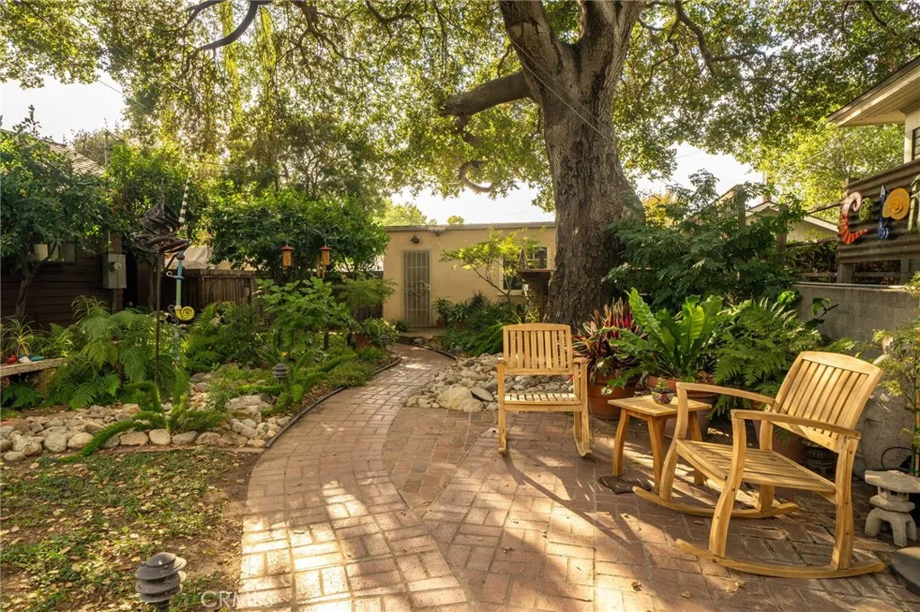 335 Harvard Avenue North Claremont, CA 91711 - Photo 28 of 71 a view of backyard with outdoor seating and plants