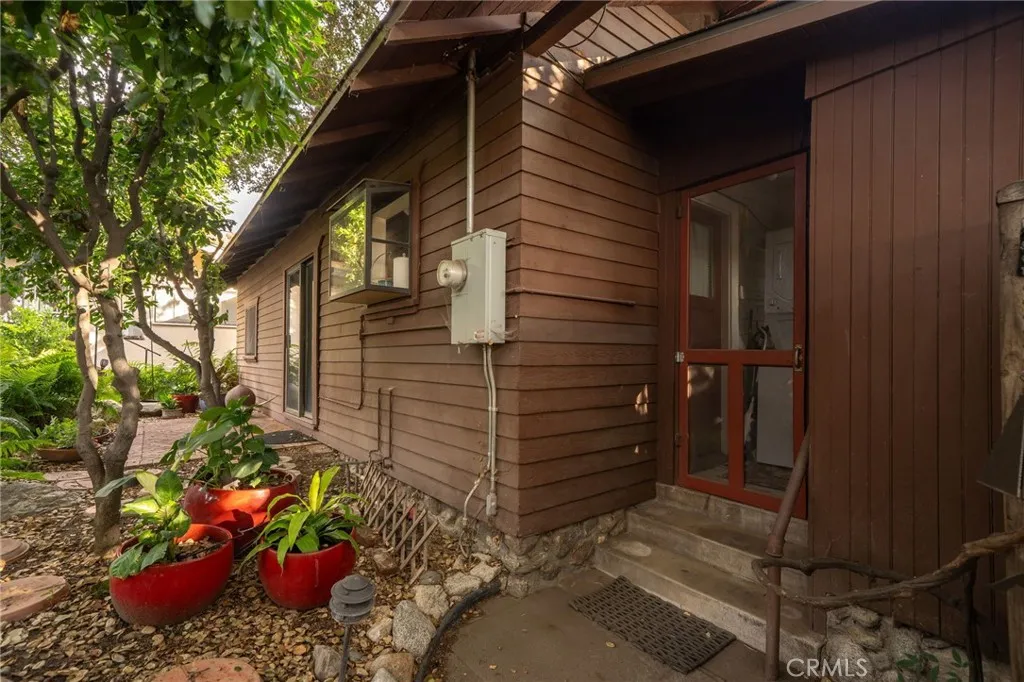 335 Harvard Avenue North Claremont, CA 91711 - Photo 35 of 71 a view of a house with a flower garden