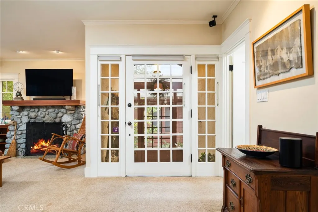 335 Harvard Avenue North Claremont, CA 91711 - Photo 6 of 71 a view of a livingroom with furniture and a fireplace