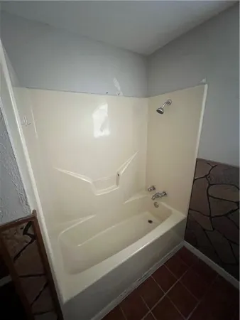 a bathroom with a bathtub