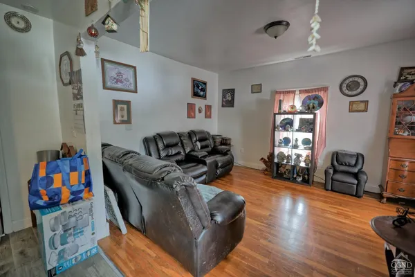 a kitchen that has a sink and a stove in it